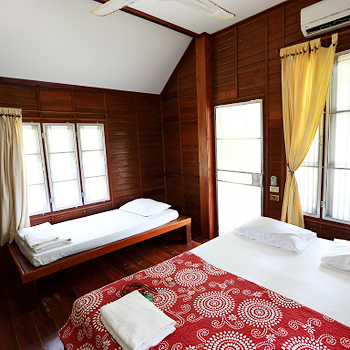 Sunset view over Tubtim Resort fan bungalows by the sea